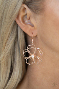 Layers of heart-shaped petals molded from shiny rose gold wire create an airy three-dimensional flower. A dainty white rhinestone dots the center adding sparkle to the whimsical frame. Earring attaches to a standard fishhook fitting.
Sold as one pair of earrings. Layers of heart-shaped petals molded from shiny rose gold wire create an airy three-dimensional flower. A dainty white rhinestone dots the center adding sparkle to the whimsical frame. Earring attaches to a standard fishhook fitting.
Sold as one pair of earrings.