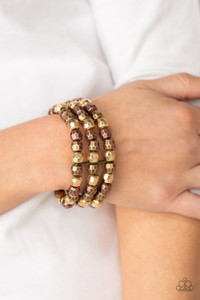 Held together with dainty brass fittings, rows of faceted brass, copper, and gold beads are threaded along stretchy bands around the wrist, coalescing into bold layers.
Sold as one individual bracelet. Held together with dainty brass fittings, rows of faceted brass, copper, and gold beads are threaded along stretchy bands around the wrist, coalescing into bold layers.
Sold as one individual bracelet.