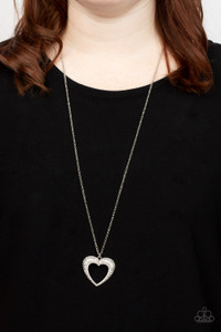 A flared silver heart is encrusted in glassy white rhinestones, resulting in a romantic shimmer at the bottom of an extended silver chain. Features an adjustable clasp closure.
Sold as one individual necklace. Includes one pair of matching earrings. A flared silver heart is encrusted in glassy white rhinestones, resulting in a romantic shimmer at the bottom of an extended silver chain. Features an adjustable clasp closure.
Sold as one individual necklace. Includes one pair of matching earrings.