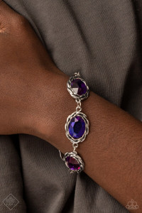 A row of brilliantly faceted gems is encased in layered antiqued silver frames. Featuring a metallic-like finish, the oval multicolored purple gems link end to end for an illustrious appeal around the wrist. Features an adjustable clasp closure.
Sold as one individual bracelet. A row of brilliantly faceted gems is encased in layered antiqued silver frames. Featuring a metallic-like finish, the oval multicolored purple gems link end to end for an illustrious appeal around the wrist. Features an adjustable clasp closure.
Sold as one individual bracelet.