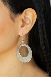 Brushed in antiqued shimmer, a round silver frame is scratched in a gritty linear pattern for a rustic fashion. Earring attaches to a standard fishhook fitting.
Sold as one pair of earrings. Brushed in antiqued shimmer, a round silver frame is scratched in a gritty linear pattern for a rustic fashion. Earring attaches to a standard fishhook fitting.
Sold as one pair of earrings.