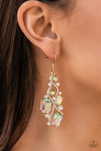 Golden ribbons of glassy white rhinestones whirl around a chandelier of classic round white rhinestones and emerald and square cut iridescent rhinestones, coalescing into an effervescent elegance. Earring attaches to a standard fishhook fitting.
Sold as one pair of earrings. Golden ribbons of glassy white rhinestones whirl around a chandelier of classic round white rhinestones and emerald and square cut iridescent rhinestones, coalescing into an effervescent elegance. Earring attaches to a standard fishhook fitting.
Sold as one pair of earrings.