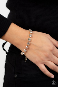 Featuring pronged gold fittings, an oversized row of glassy white rhinestones connect around the wrist for a glamorous pop of glitz. Features an adjustable clasp closure.
Sold as one individual bracelet. Featuring pronged gold fittings, an oversized row of glassy white rhinestones connect around the wrist for a glamorous pop of glitz. Features an adjustable clasp closure.
Sold as one individual bracelet.