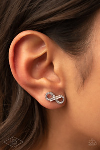 Glassy emerald-cut rhinestones embellish a radiant infinity. Dainty white rhinestones are sprinkled along the swooping silver frame, adding additional sparkling accents to the romantic design. Earring attaches to a standard post fitting.
Sold as one pair of post earrings. Glassy emerald-cut rhinestones embellish a radiant infinity. Dainty white rhinestones are sprinkled along the swooping silver frame, adding additional sparkling accents to the romantic design. Earring attaches to a standard post fitting.
Sold as one pair of post earrings.