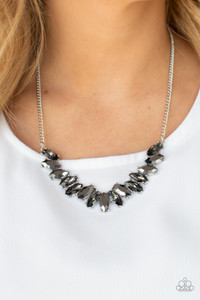 Featuring pronged silver fittings, a sparkly series of iridescent marquise cut rhinestones fan out below the collar for a stellar statement-making look. Features an adjustable clasp closure.
Sold as one individual necklace. Includes one pair of matching earrings. Featuring pronged silver fittings, a sparkly series of iridescent marquise cut rhinestones fan out below the collar for a stellar statement-making look. Features an adjustable clasp closure.
Sold as one individual necklace. Includes one pair of matching earrings.