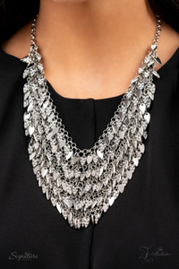 Enhanced with edgy sharpened tips, a seemingly infinite display of plain silver and white rhinestone encrusted teardrop discs dauntlessly drips from an interconnected backdrop of sleek silver links. The ferocious display of alternating dazzle fearlessly dances to its own beat, creating a flirtatiously fierce fringe below the collar. Features an adjustable clasp closure.
Named after the 2021 Seize the Spotlight winner, NaKisha M.
Sold as one individual necklace. Includes one pair of matching earrings. Enhanced with edgy sharpened tips, a seemingly infinite display of plain silver and white rhinestone encrusted teardrop discs dauntlessly drips from an interconnected backdrop of sleek silver links. The ferocious display of alternating dazzle fearlessly dances to its own beat, creating a flirtatiously fierce fringe below the collar. Features an adjustable clasp closure.
Named after the 2021 Seize the Spotlight winner, NaKisha M.
Sold as one individual necklace. Includes one pair of matching earrings.