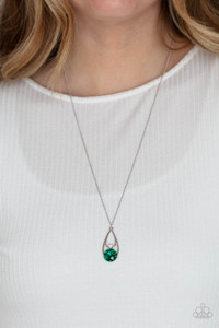 Two silver teardrops delicately overlap in a solitaire pendant at the bottom of a shiny silver chain. A dainty white rhinestone dots the bottom of the highest teardrop, while an oversized green gem adorns the lowermost teardrop, coalescing into a sparkly centerpiece. Features an adjustable clasp closure.
Sold as one individual necklace. Includes one pair of matching earrings. Two silver teardrops delicately overlap in a solitaire pendant at the bottom of a shiny silver chain. A dainty white rhinestone dots the bottom of the highest teardrop, while an oversized green gem adorns the lowermost teardrop, coalescing into a sparkly centerpiece. Features an adjustable clasp closure.
Sold as one individual necklace. Includes one pair of matching earrings.