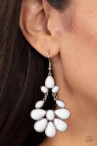 Encased in textured silver fittings, a mismatched collection of oval, marquise, and teardrop white beads connect and link into a vivacious lure. Earring attaches to a standard fishhook fitting.
Sold as one pair of earrings. Encased in textured silver fittings, a mismatched collection of oval, marquise, and teardrop white beads connect and link into a vivacious lure. Earring attaches to a standard fishhook fitting.
Sold as one pair of earrings.