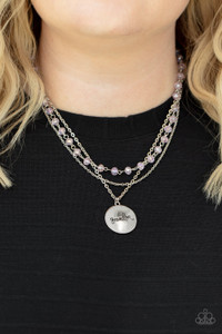 Infused with a strand of iridescent pink crystal-like beads, two dainty rows of mismatched silver chains delicately layer below the collar. Stamped in the word, "Grandma," a shiny silver disc swings from the lowest chain, creating a loving pendant. Features an adjustable clasp closure.
Sold as one individual necklace. Includes one pair of matching earrings. Infused with a strand of iridescent pink crystal-like beads, two dainty rows of mismatched silver chains delicately layer below the collar. Stamped in the word, "Grandma," a shiny silver disc swings from the lowest chain, creating a loving pendant. Features an adjustable clasp closure.
Sold as one individual necklace. Includes one pair of matching earrings.