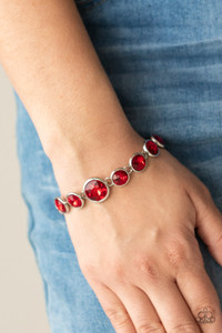 Featuring sleek silver fittings, an oversized collection of fiery red gems delicately link around the wrist. The centermost gem is slightly larger than the rest, adding a glamorous finish. Features an adjustable clasp closure.
Sold as one individual bracelet. Featuring sleek silver fittings, an oversized collection of fiery red gems delicately link around the wrist. The centermost gem is slightly larger than the rest, adding a glamorous finish. Features an adjustable clasp closure.
Sold as one individual bracelet.