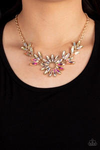 Featuring oblong marquise cuts, a collection of iridescent gems join into leafy frames below the collar. Radiating with the same iridescent intensity, even more stellar rhinestones fan out into a circular focal point, resulting in a celestial centerpiece. Features an adjustable clasp closure. Due to its prismatic palette, color may vary.
Sold as one individual necklace. Includes one pair of matching earrings. Featuring oblong marquise cuts, a collection of iridescent gems join into leafy frames below the collar. Radiating with the same iridescent intensity, even more stellar rhinestones fan out into a circular focal point, resulting in a celestial centerpiece. Features an adjustable clasp closure. Due to its prismatic palette, color may vary.
Sold as one individual necklace. Includes one pair of matching earrings.