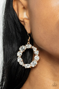 Featuring glistening gold fittings, a regal assortment of round, triangular, teardrop, marquise, and emerald cut white rhinestones delicately coalesce into a jaw-dropping hoop. Earring attaches to a standard fishhook fitting.
Sold as one pair of earrings Featuring glistening gold fittings, a regal assortment of round, triangular, teardrop, marquise, and emerald cut white rhinestones delicately coalesce into a jaw-dropping hoop. Earring attaches to a standard fishhook fitting.
Sold as one pair of earrings
