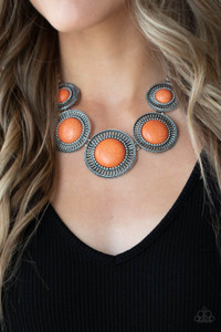 Earthy orange stones, pressed into round antiqued silver frames featuring dot and interlinking loop motifs, create a dramatically rustic statement as they link across the collar. Features an adjustable clasp closure.
Sold as one individual necklace. Includes one pair of matching earrings. Earthy orange stones, pressed into round antiqued silver frames featuring dot and interlinking loop motifs, create a dramatically rustic statement as they link across the collar. Features an adjustable clasp closure.
Sold as one individual necklace. Includes one pair of matching earrings.