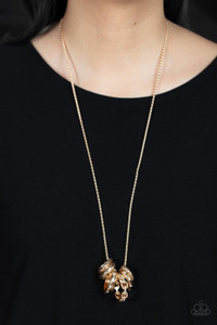 Featuring white rhinestones, faceted surfaces, twisted finishes, and chain-like patterns, an edgy collection of mismatched gold rings glide along a lengthened gold popcorn chain in a glamorously gritty finish. Features an adjustable clasp closure.
Sold as one individual necklace. Includes one pair of matching earrings. Featuring white rhinestones, faceted surfaces, twisted finishes, and chain-like patterns, an edgy collection of mismatched gold rings glide along a lengthened gold popcorn chain in a glamorously gritty finish. Features an adjustable clasp closure.
Sold as one individual necklace. Includes one pair of matching earrings.