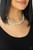 Infused with dainty silver accents, a collection of dainty and classic blue or purple pearls are threaded along an invisible wire below the collar for a timeless look. Features an adjustable clasp closure.
Sold as one individual necklace. Includes one pair of matching earrings. Infused with dainty silver accents, a collection of dainty and classic blue or purple pearls are threaded along an invisible wire below the collar for a timeless look. Features an adjustable clasp closure.
Sold as one individual necklace. Includes one pair of matching earrings.