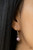 Infused with dainty silver accents, a collection of dainty and classic blue or purple pearls are threaded along an invisible wire below the collar for a timeless look. Features an adjustable clasp closure.
Sold as one individual necklace. Includes one pair of matching earrings. Infused with dainty silver accents, a collection of dainty and classic blue or purple pearls are threaded along an invisible wire below the collar for a timeless look. Features an adjustable clasp closure.
Sold as one individual necklace. Includes one pair of matching earrings.