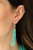 Infused with two bold silver fittings, countless strands of turquoise seed beads drape below the collar for a seasonal look. Features an adjustable clasp closure.
Sold as one individual necklace. Includes one pair of matching earrings. Infused with two bold silver fittings, countless strands of turquoise seed beads drape below the collar for a seasonal look. Features an adjustable clasp closure.
Sold as one individual necklace. Includes one pair of matching earrings.