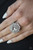 An oversized oval white gem is pressed into the center of a round silver frame encrusted in mismatched white rhinestones for a glamorous look. Features a stretchy band for a flexible fit.
Sold as one individual ring. An oversized oval white gem is pressed into the center of a round silver frame encrusted in mismatched white rhinestones for a glamorous look. Features a stretchy band for a flexible fit.
Sold as one individual ring.