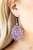 Brushed in a sunny yellow or rustic purple finish, a flowery filled silver frame coalesces into a whimsical teardrop for a seasonal look. Earring attaches to a standard fishhook fitting.

Sold as one pair of earrings.