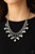 A collection of bubbly silver pearls, glittery white rhinestones, and ornate silver beads swing from the bottom of a shimmery silver chain, creating a refined fringe below the collar. Features an adjustable clasp closure.
Sold as one individual necklace. Includes one pair of matching earrings. A collection of bubbly silver pearls, glittery white rhinestones, and ornate silver beads swing from the bottom of a shimmery silver chain, creating a refined fringe below the collar. Features an adjustable clasp closure.
Sold as one individual necklace. Includes one pair of matching earrings.