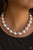 Infused with dainty silvery rhinestone encrusted beads, a refined collection of oversized silver or pink pearls are threaded along an invisible wire below the collar for a timeless dazzle. Features an adjustable clasp closure.
Sold as one individual necklace. Includes one pair of matching earrings. Infused with dainty silvery rhinestone encrusted beads, a refined collection of oversized silver or pink pearls are threaded along an invisible wire below the collar for a timeless dazzle. Features an adjustable clasp closure.
Sold as one individual necklace. Includes one pair of matching earrings.