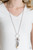 Infused with shimmery silver chains, a collection of earthy brown beads, cloudy beads, and glistening silver feather charms swing from the bottom of a bold silver hoop. The whimsical tassel attaches to a lengthened silver chain for a seasonal finish. Features an adjustable clasp closure.
Sold as one individual necklace. Includes one pair of matching earrings. Infused with shimmery silver chains, a collection of earthy brown beads, cloudy beads, and glistening silver feather charms swing from the bottom of a bold silver hoop. The whimsical tassel attaches to a lengthened silver chain for a seasonal finish. Features an adjustable clasp closure.
Sold as one individual necklace. Includes one pair of matching earrings.