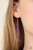 Rows of shimmery silver chain merge with shiny purple chains, creating colorful layers below the collar. Features an adjustable clasp closure.

Sold as one individual necklace. Includes one pair of matching earrings.