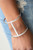 Glassy white rhinestones are encrusted down the spine of an airy gold or silver cuff for an edgy look.
Sold as one individual bracelet. Glassy white rhinestones are encrusted down the spine of an airy gold or silver cuff for an edgy look.
Sold as one individual bracelet.