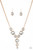 Featuring sleek gold frames, a dramatic collection of white gems cascade from the bottom of a thick gold chain. Additional gems trickle from the center, creating a glamorous extended pendant below the collar. Features an adjustable clasp closure.

Sold as one individual necklace. Includes one pair of matching earrings.