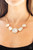 Infused with a heavy gold chain, an exaggerated display of round and teardrop-shaped white rhinestones connects below the collar for a blinding look. Features an adjustable clasp closure.
Sold as one individual necklace. Includes one pair of matching earrings. Infused with a heavy gold chain, an exaggerated display of round and teardrop-shaped white rhinestones connects below the collar for a blinding look. Features an adjustable clasp closure.
Sold as one individual necklace. Includes one pair of matching earrings.