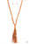 Shiny silver beads are knotted in place along strands of orange cording that have been knotted into an edgy tassel at the bottom of matching lengthened cording. Features an adjustable clasp closure.
Sold as one individual necklace. Includes one pair of matching earrings. Shiny silver beads are knotted in place along strands of orange cording that have been knotted into an edgy tassel at the bottom of matching lengthened cording. Features an adjustable clasp closure.
Sold as one individual necklace. Includes one pair of matching earrings.