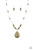 A collection of shiny silver beads and earthy Military Olive stone beads are threaded along an invisible wire below the collar. A dramatically oversized Military Olive stone teardrop pendant swings from the bottom of a seasonal flair. Features an adjustable clasp closure.
Sold as one individual necklace. Includes one pair of matching earrings. A collection of shiny silver beads and earthy Military Olive stone beads are threaded along an invisible wire below the collar. A dramatically oversized Military Olive stone teardrop pendant swings from the bottom of a seasonal flair. Features an adjustable clasp closure.
Sold as one individual necklace. Includes one pair of matching earrings.
