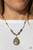 A collection of shiny silver beads and earthy Military Olive stone beads are threaded along an invisible wire below the collar. A dramatically oversized Military Olive stone teardrop pendant swings from the bottom of a seasonal flair. Features an adjustable clasp closure.
Sold as one individual necklace. Includes one pair of matching earrings. A collection of shiny silver beads and earthy Military Olive stone beads are threaded along an invisible wire below the collar. A dramatically oversized Military Olive stone teardrop pendant swings from the bottom of a seasonal flair. Features an adjustable clasp closure.
Sold as one individual necklace. Includes one pair of matching earrings.