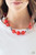 Infused with dainty silver accents, exaggerated display of oversized silver beads, faceted red crystal-like beads, and cloudy red beads are threaded along an invisible wire below the collar for a colorfully statement-making fashion. Features an adjustable clasp closure.
Sold as one individual necklace. Includes one pair of matching earrings. Infused with dainty silver accents, exaggerated display of oversized silver beads, faceted red crystal-like beads, and cloudy red beads are threaded along an invisible wire below the collar for a colorfully statement-making fashion. Features an adjustable clasp closure.
Sold as one individual necklace. Includes one pair of matching earrings.