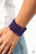 Painted in a vivacious purple finish, round and oval wooden beads are threaded along stretchy bands that weave into a colorful floral patterned stretch bracelet around the wrist.
Sold as one individual bracelet. Painted in a vivacious purple finish, round and oval wooden beads are threaded along stretchy bands that weave into a colorful floral patterned stretch bracelet around the wrist.
Sold as one individual bracelet.