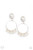 Featuring a pearl dotted fringe, a dainty silver wire hoop swings from the bottom of a matching pearl dotted fitting for a refined flair. Earring attaches to a standard clip-on fitting.

Sold as one pair of clip-on earrings.