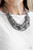 Brushed in a flashy finish, countless strands of silver and gunmetal seed beads weave into a bulky square braid below the collar for a glamorous look. Features an adjustable clasp closure.
Sold as one individual necklace. Includes one pair of matching earrings. Brushed in a flashy finish, countless strands of silver and gunmetal seed beads weave into a bulky square braid below the collar for a glamorous look. Features an adjustable clasp closure.
Sold as one individual necklace. Includes one pair of matching earrings.