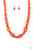 Varying in size and shape, a hearty collection of glassy, hammered, and polished orange beads are threaded along an invisible wire below the collar. Dainty silver beads and discs are sprinkled along the colorful collaboration for a shimmery finish. Features an adjustable clasp closure.

Sold as one individual necklace. Includes one pair of matching earrings.
