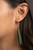 A trio of ornate silver beads give way to a Military Olive suede tassel knotted at the bottom of a lengthened strand of Military Olive suede for an earthy flair. Features a knotted closure.
Sold as one individual necklace. Includes one pair of matching earrings. A trio of ornate silver beads give way to a Military Olive suede tassel knotted at the bottom of a lengthened strand of Military Olive suede for an earthy flair. Features a knotted closure.
Sold as one individual necklace. Includes one pair of matching earrings.