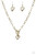 Cut into a whimsical heart shape, a glittery white gem swings from the bottom of a glistening silver or brass chain below the collar for a charming look. Features a toggle closure.
Sold as one individual necklace. Includes one pair of matching earrings. Cut into a whimsical heart shape, a glittery white gem swings from the bottom of a glistening silver or brass chain below the collar for a charming look. Features a toggle closure.
Sold as one individual necklace. Includes one pair of matching earrings.