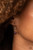 Encrusted with a ring of glittery white rhinestones, a wavy silver frame nestles around a glassy purple cat's eye stone. The dewy frame slides along a rounded silver snake chain, creating a glistening pendant below the collar. Features an adjustable clasp closure.
Sold as one individual necklace. Includes one pair of matching earrings. Encrusted with a ring of glittery white rhinestones, a wavy silver frame nestles around a glassy purple cat's eye stone. The dewy frame slides along a rounded silver snake chain, creating a glistening pendant below the collar. Features an adjustable clasp closure.
Sold as one individual necklace. Includes one pair of matching earrings.