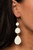 Featuring sleek silver fittings, a dainty collection of round, octagon, and teardrop shell-like frames link into a sleek lure. Earring attaches to a standard fishhook fitting.

Sold as one pair of earrings.