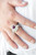 Featuring regal teardrop cuts, glittery white rhinestones flare from the center of a purple pearl drop center. Dainty white rhinestones spin around the pearly center for a glamorous finish. Features a stretchy band for a flexible fit.
Sold as one individual ring. Featuring regal teardrop cuts, glittery white rhinestones flare from the center of a purple pearl drop center. Dainty white rhinestones spin around the pearly center for a glamorous finish. Features a stretchy band for a flexible fit.
Sold as one individual ring.