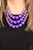 Varying in shape and opacity, a collection of round and asymmetrical purple beads are threaded along invisible wires below the collar. Shiny silver beads sprinkled along the strands, adding hints of shimmer to the fruity layers. Features an adjustable clasp closure.

Sold as one individual necklace. Includes one pair of matching earrings.