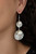Oversized white pearls and hammered silver discs delicately link into a bubbly lure for a refined flair. Earring attaches to a standard fishhook fitting.
Sold as one pair of earrings. Oversized white pearls and hammered silver discs delicately link into a bubbly lure for a refined flair. Earring attaches to a standard fishhook fitting.
Sold as one pair of earrings.