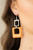 A cutout square painted in the bold Pantone® of Marigold sways from a shiny silver cutout square for a playful finish. Earring attaches to a standard fishhook fitting.
Sold as one pair of earrings. A cutout square painted in the bold Pantone® of Marigold sways from a shiny silver cutout square for a playful finish. Earring attaches to a standard fishhook fitting.
Sold as one pair of earrings.