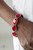 Glassy red gems are pressed into sleek silver frames. Infused with dainty silver beads, the glittery frames are threaded along stretchy elastic bands for a glamorous look around the wrist.
Sold as one individual bracelet. Glassy red gems are pressed into sleek silver frames. Infused with dainty silver beads, the glittery frames are threaded along stretchy elastic bands for a glamorous look around the wrist.
Sold as one individual bracelet.
