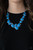 Featuring the vibrant hue of French Blue, mismatched teardrop, rectangular, and round beaded frames delicately link below the collar. Hints of glassy white rhinestones are scattered throughout the display, adding a dash of refinement to the colorful statement piece. Features an adjustable clasp closure.
Sold as one individual necklace. Includes one pair of matching earrings. Featuring the vibrant hue of French Blue, mismatched teardrop, rectangular, and round beaded frames delicately link below the collar. Hints of glassy white rhinestones are scattered throughout the display, adding a dash of refinement to the colorful statement piece. Features an adjustable clasp closure.
Sold as one individual necklace. Includes one pair of matching earrings.