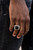 Painted in a shiny finish, a bold black square is bordered by silver studded detail atop a textured silver band for a sophisticated look. Features a stretchy band for a flexible fit.

Sold as one individual ring.