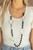 Connecting to strands of basic silver links, cloudy black beads alternate with hammered silver discs and oversized rings creating a subtle seaside vibe as they fall across the chest. Features an adjustable clasp closure.
Sold as one individual necklace. Includes one pair of matching earrings. Connecting to strands of basic silver links, cloudy black beads alternate with hammered silver discs and oversized rings creating a subtle seaside vibe as they fall across the chest. Features an adjustable clasp closure.
Sold as one individual necklace. Includes one pair of matching earrings.